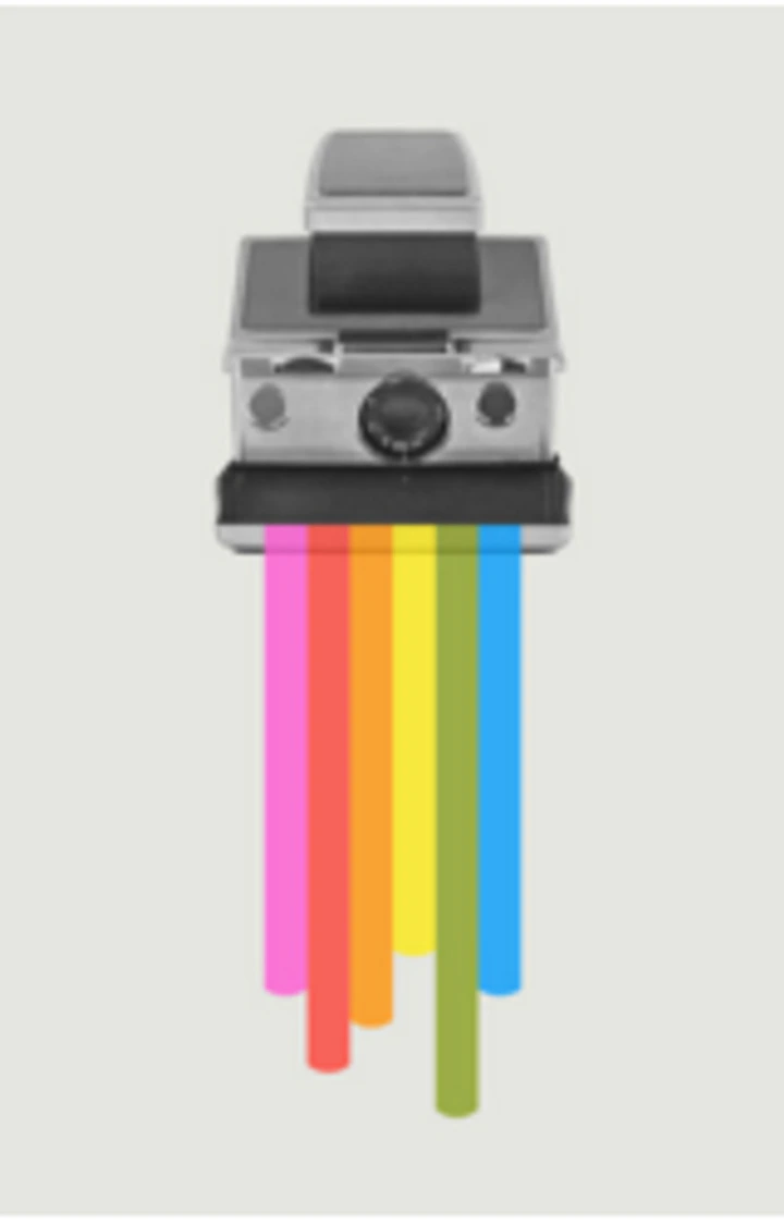 Instant camera printing vertical rainbow stripes